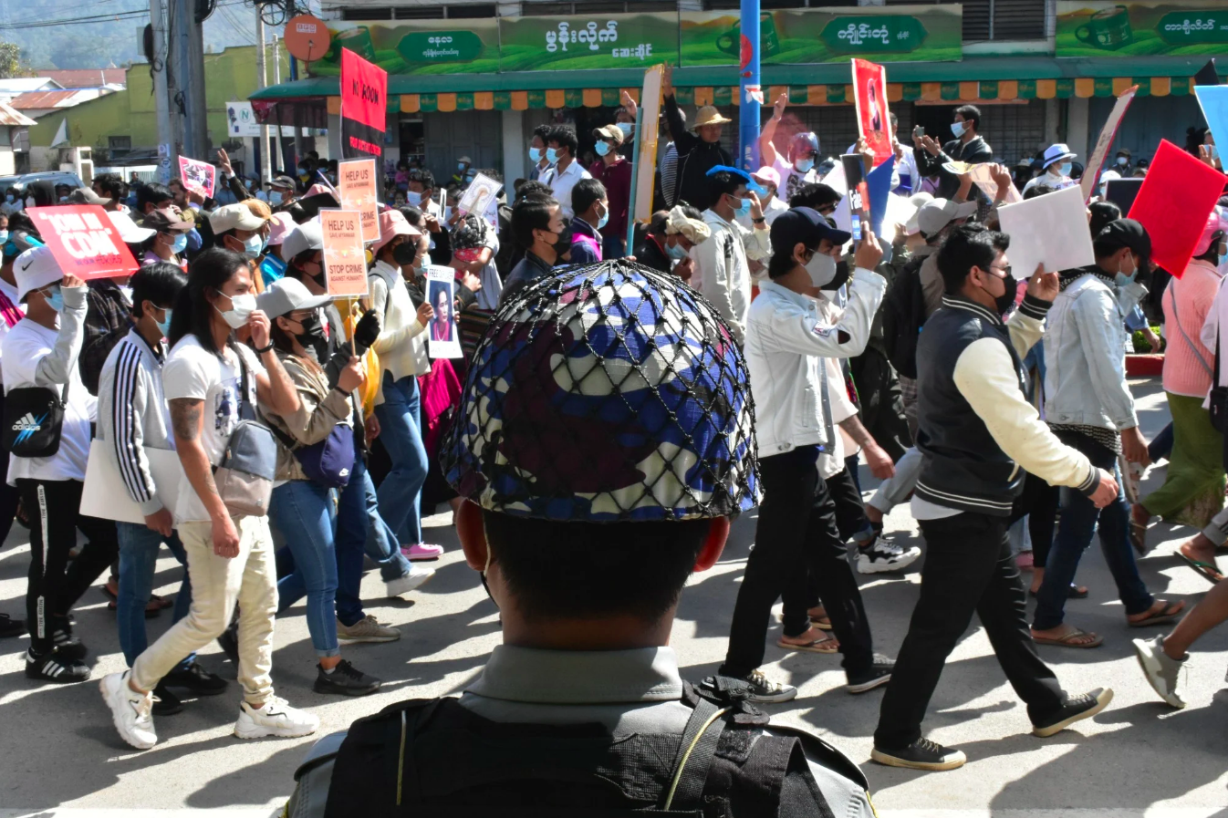 People march during a protest in Taunggyi, the capital of Shan State. Image: Robert Bociaga.